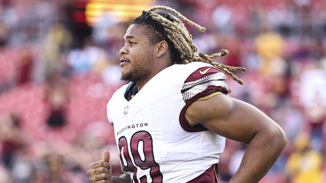 LANDOVER, MARYLAND - AUGUST 26: Chase Young #99 of the Washington Commanders runs as he takes the field prior to an NFL preseason game between the Washington Commanders and the Cincinnati Bengals at FedExField on August 26, 2023 in Landover, Maryland.