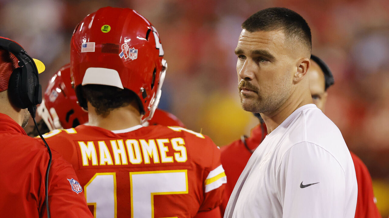 KANSAS CITY, MISSOURI - SEPTEMBER 07: An injured Travis Kelce #87 of the Kansas City Chiefs looks on from the sideline against the Detroit Lions at GEHA Field at Arrowhead Stadium on September 07, 2023 in Kansas City, Missouri.