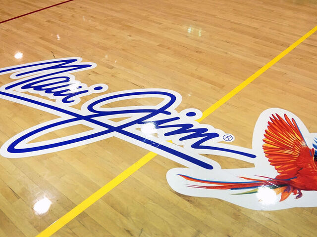 LAHAINA, HI - NOVEMBER 22: The Maui Jim logo on the floor during a second round game of the Maui Jim Invitational college basketball Tournament between the Arkansas Razorbacks and the Arkansas Razorbacks at Lahaina Civic Arena on November 22, 2022 in Lahaina, Hawaii.