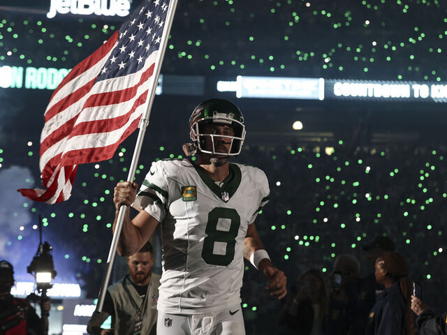EAST RUTHERFORD, NEW JERSEY - SEPTEMBER 11: Aaron Rodgers #8 of the New York Jets takes the field prior to a game against the Buffalo Bills at MetLife Stadium on September 11, 2023 in East Rutherford, New Jersey.