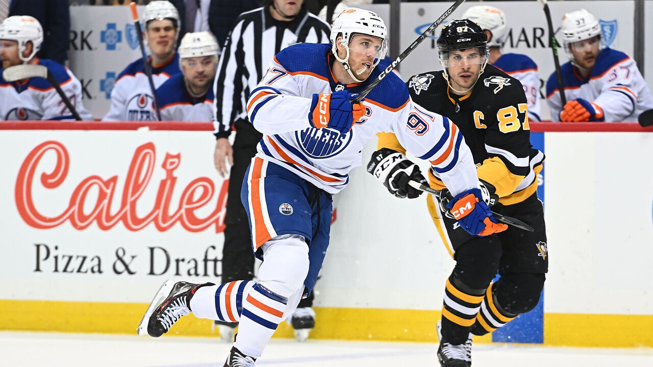 PITTSBURGH, PA - FEBRUARY 23: Connor McDavid #97 of the Edmonton Oilers skates against Sidney Crosby #87 of the Pittsburgh Penguins in the second period during the game at PPG PAINTS Arena on February 23, 2023 in Pittsburgh, Pennsylvania.