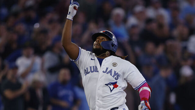 TORONTO, CANADA - SEPTEMBER 15: Vladimir Guerrero Jr. #27 of the Toronto Blue Jays celebrates a three-run home run as he rounds home in the third inning against the Boston Red Sox at Rogers Centre on September 15, 2023 in Toronto, Canada.