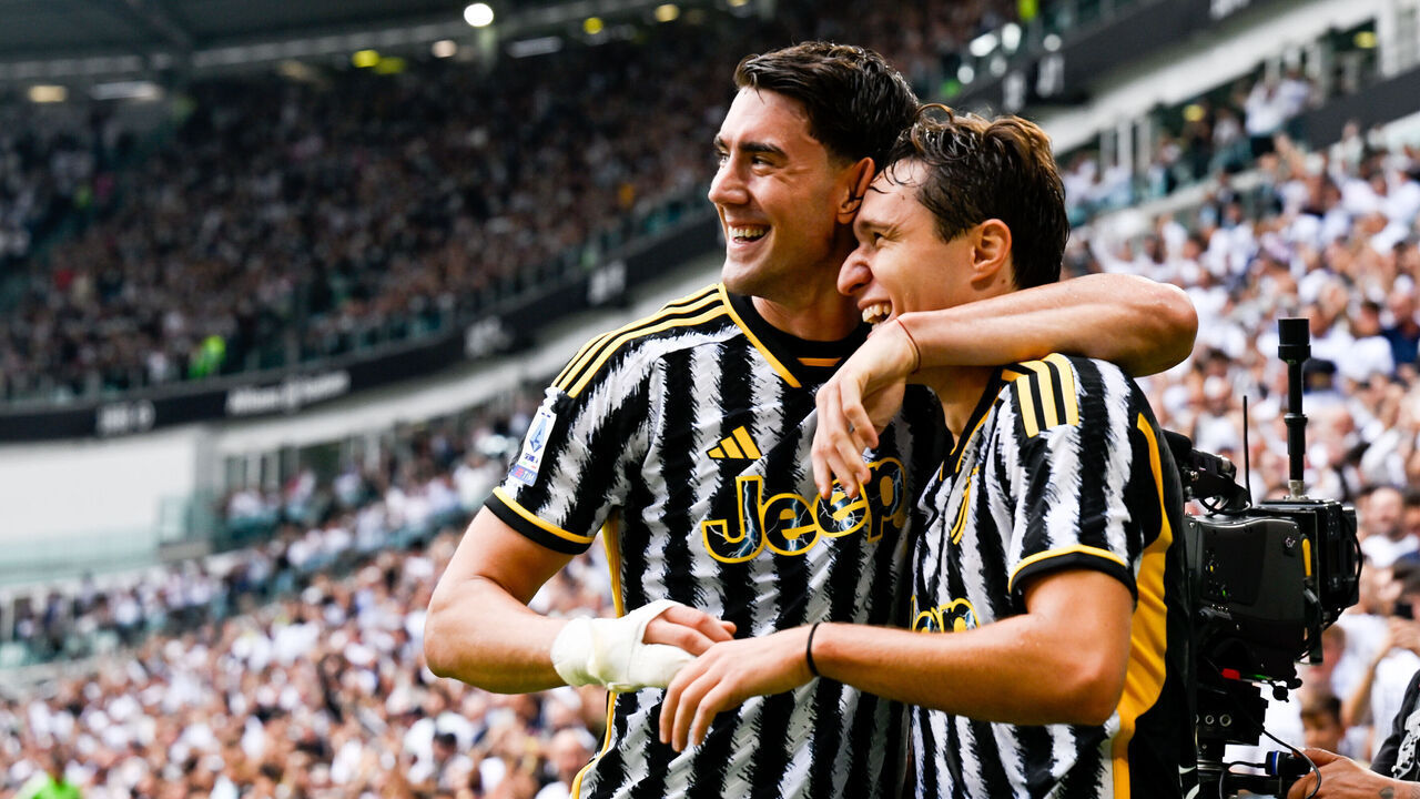 TURIN, ITALY - SEPTEMBER 16: Federico Chiesa of Juventus celebrates after scoring his team's second goal with teammate Dusan Vlahovic during the Serie A TIM match between Juventus and SS Lazio at Allianz Stadium on September 16, 2023 in Turin, Italy.