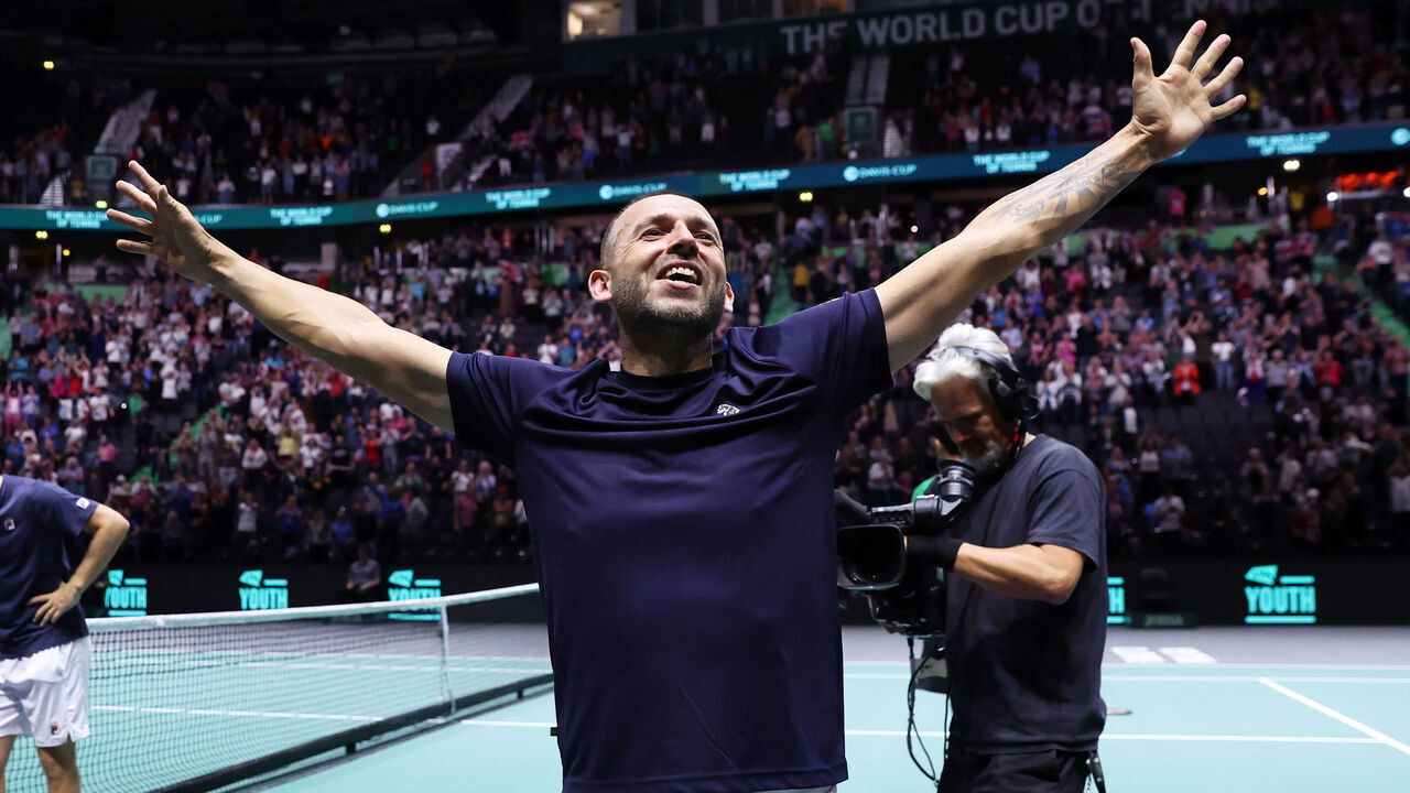 MANCHESTER, ENGLAND - SEPTEMBER 17: Daniel Evans of Great Britain celebrates after victory against Nicolas Mahut and Edouard Roger-Vasselin of France during the Great Britain v France Davis Cup Finals Group Stage Match 3, on Day 6 at AO Arena on September 17, 2023 in Manchester, England.