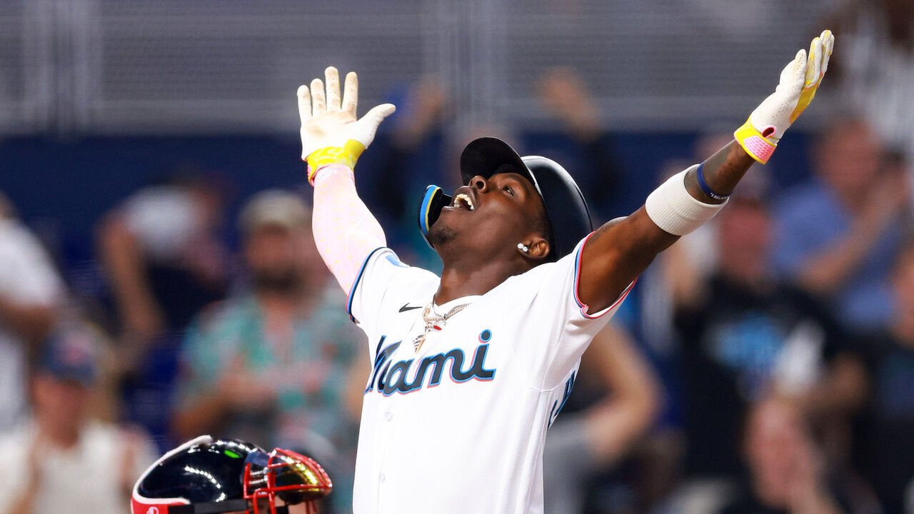 MIAMI, FLORIDA - SEPTEMBER 17: Jazz Chisholm Jr. #2 of the Miami Marlins reacts after hitting a grand slam home run against the Atlanta Braves during the third inning of the game at loanDepot park on September 17, 2023 in Miami, Florida.