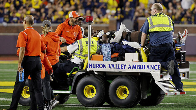 ANN ARBOR, MICHIGAN - SEPTEMBER 16: Demetrius Hardamon #11 of the Bowling Green Falcons gives a thumbs up to the crowd as he is carted off the field in the third quarter of a game against the Michigan Wolverines at Michigan Stadium on September 16, 2023 in Ann Arbor, Michigan.