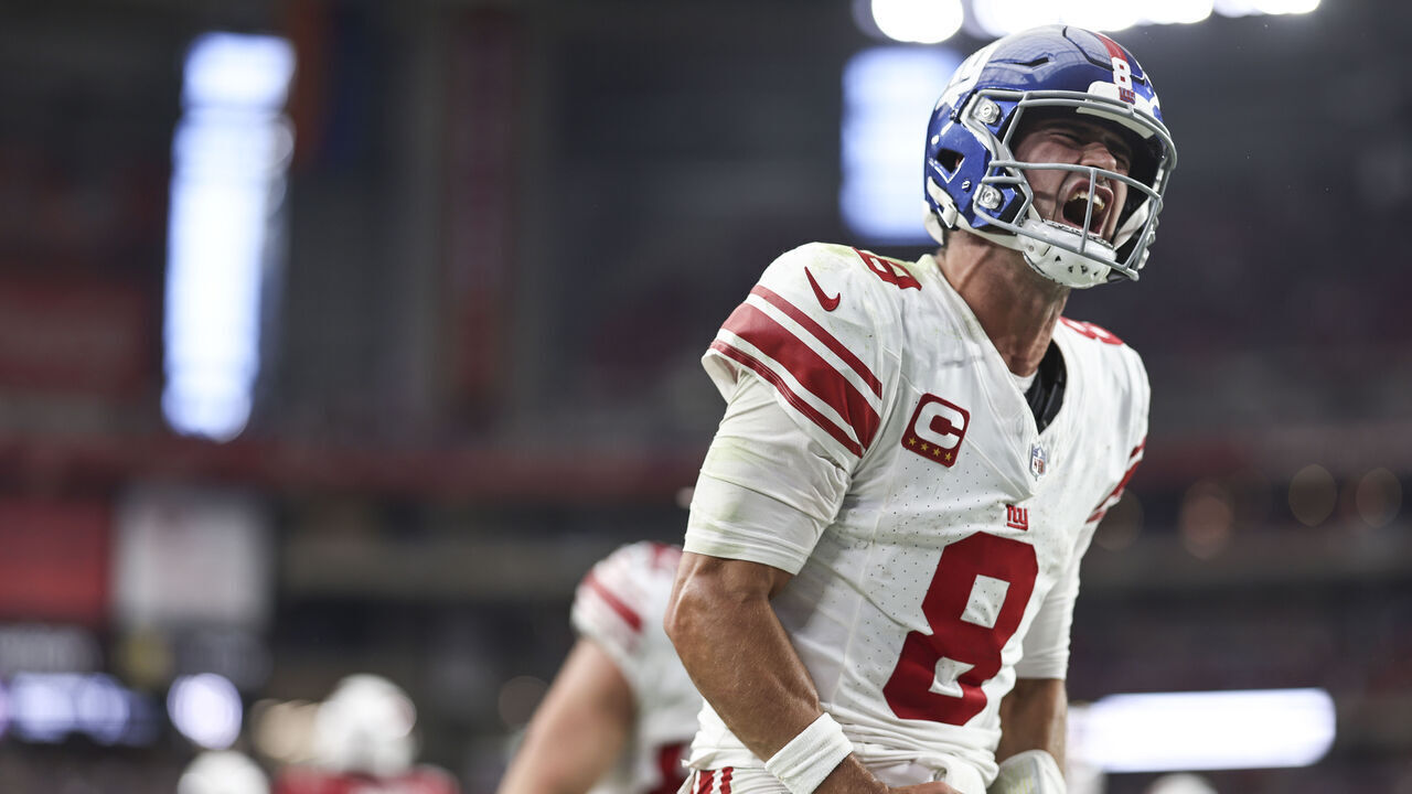 GLENDALE, ARIZONA - SEPTEMBER 17: Daniel Jones #8 of the New York Giants celebrates after running for a touchdown during the fourth quarter of an NFL football game between the Arizona Cardinals and the New York Giants at State Farm Stadium on September 17, 2023 in Glendale, Arizona.