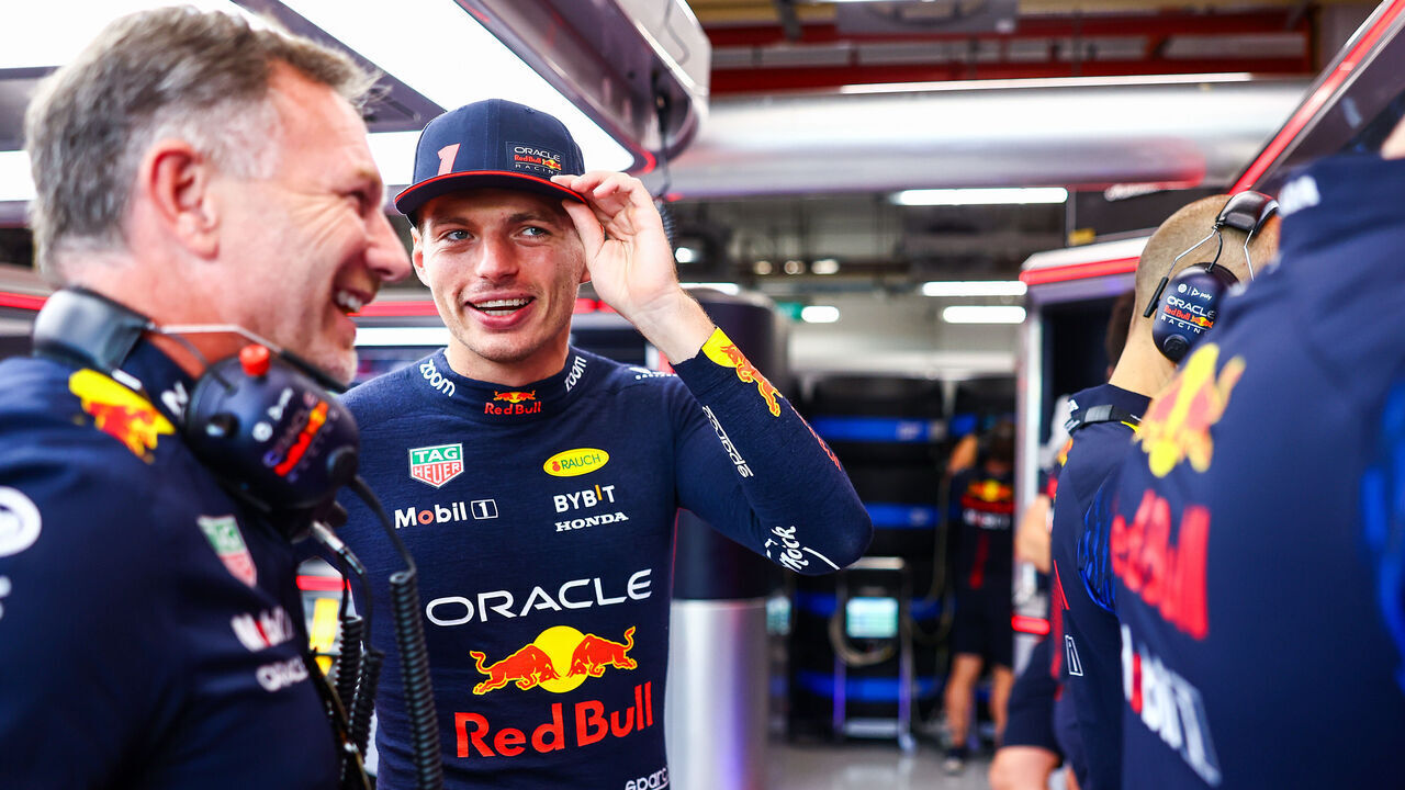 SINGAPORE, SINGAPORE - SEPTEMBER 15: Max Verstappen of the Netherlands and Oracle Red Bull Racing talks with Red Bull Racing Team Principal Christian Horner in the garage during practice ahead of the F1 Grand Prix of Singapore at Marina Bay Street Circuit on September 15, 2023 in Singapore, Singapore.