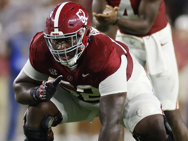 TUSCALOOSA, AL - SEPTEMBER 02: Alabama Crimson Tide offensive lineman Tyler Booker (52) lines up during a college football game against the Middle Tennessee Blue Raiders on September 02, 2023 at Bryant-Denny Stadium in Tuscaloosa, Alabama.