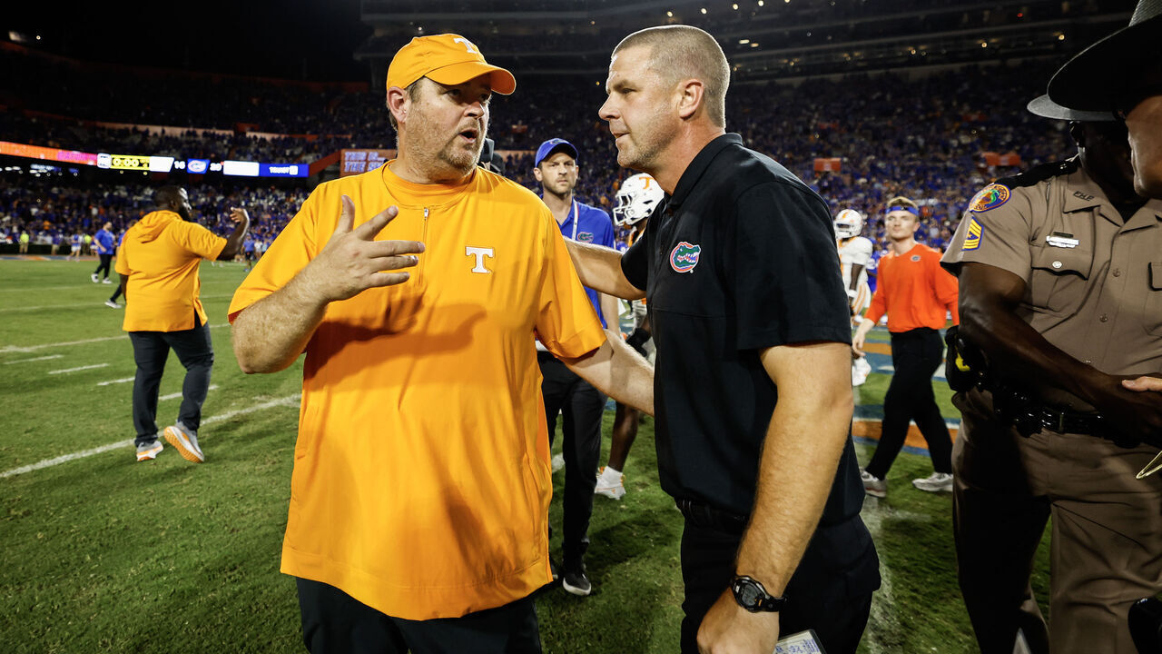 GAINESVILLE, FLORIDA - SEPTEMBER 16: Head coach Josh Heupel of the Tennessee Volunteers meets with head coach Billy Napier of the Florida Gators after a game at Ben Hill Griffin Stadium on September 16, 2023 in Gainesville, Florida.
