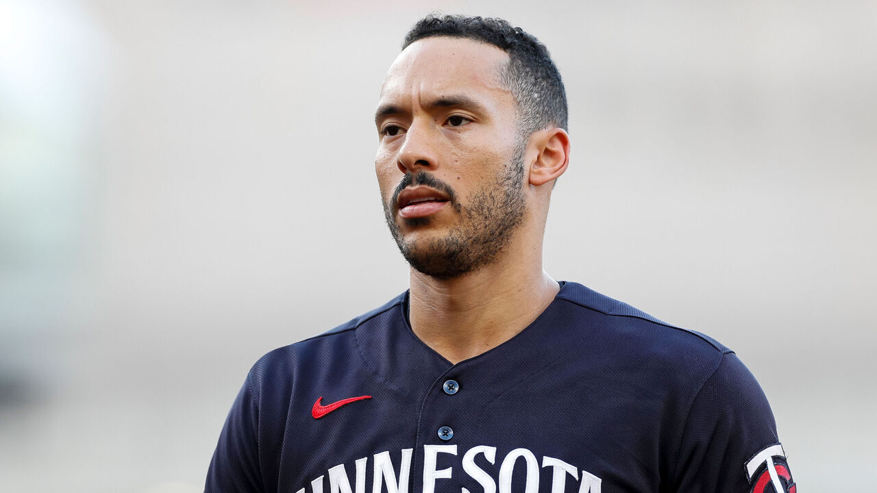 CLEVELAND, OHIO - SEPTEMBER 5: Carlos Correa #4 of the Minnesota Twins walks towards the dugout during the first inning against the Cleveland Guardians at Progressive Field on September 5, 2023 in Cleveland, Ohio.