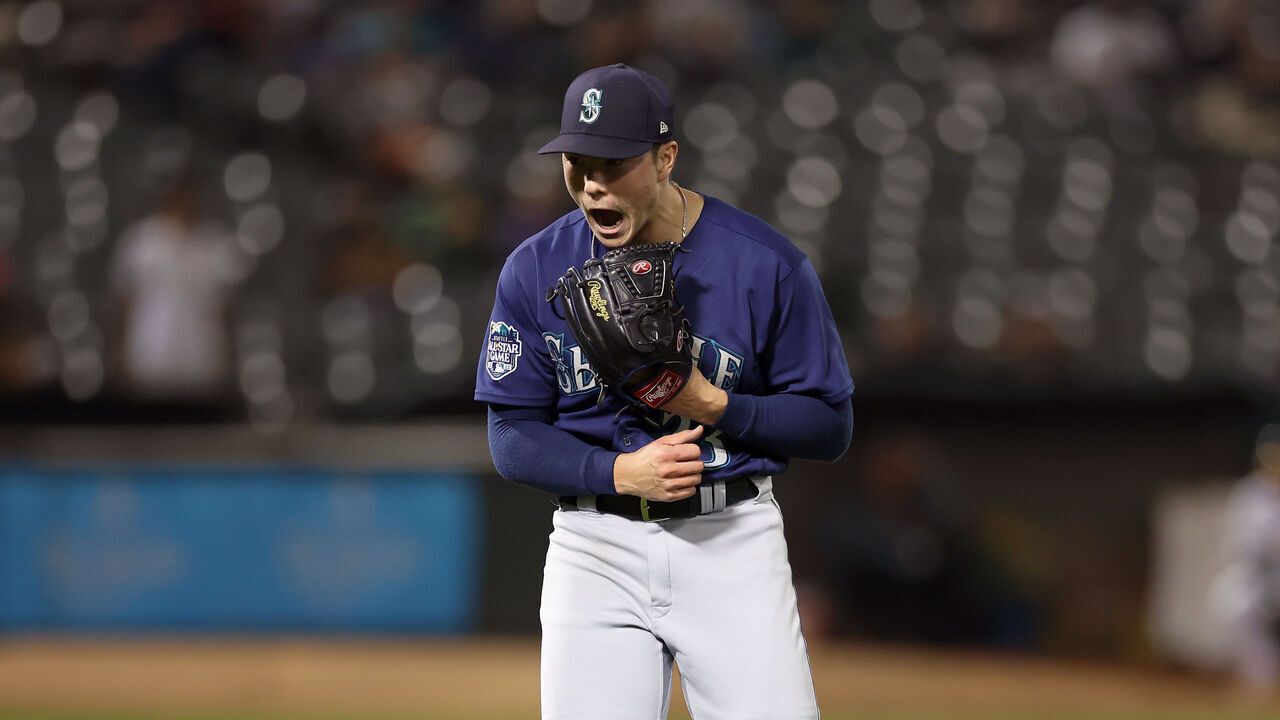 OAKLAND, CALIFORNIA - SEPTEMBER 18: Bryan Woo #33 of the Seattle Mariners reacts after the final out of the third inning of their game against the Oakland Athletics at RingCentral Coliseum on September 18, 2023 in Oakland, California.