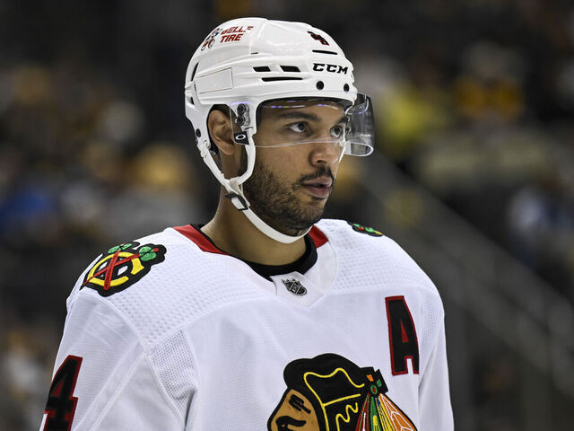 PITTSBURGH, PA - APRIL 11: Chicago Blackhawks Defenseman Seth Jones (4) looks on during the third period in the NHL game between the Pittsburgh Penguins and the Chicago Blackhawks on April 11, 2023, at PPG Paints Arena in Pittsburgh, PA.