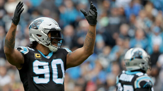 CHARLOTTE, NC - DECEMBER 24: Julius Peppers #90 of the Carolina Panthers reacts after a play against the Tampa Bay Buccaneers in the first quarter during their game at Bank of America Stadium on December 24, 2017 in Charlotte, North Carolina.