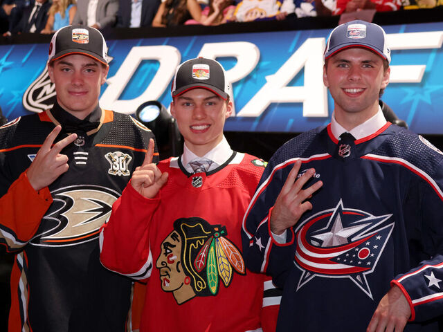 NASHVILLE, TENNESSEE - JUNE 28: (L-R) Leo Carlsson, second overall pick by the Anaheim Ducks, Connor Bedard, first overall pick by the Chicago Blackhawks, and Adam Fantilli, third overall pick by the Columbus Blue Jackets, pose for a photo during the 2023 Upper Deck NHL Draft - Round One at Bridgestone Arena on June 28, 2023 in Nashville, Tennessee.