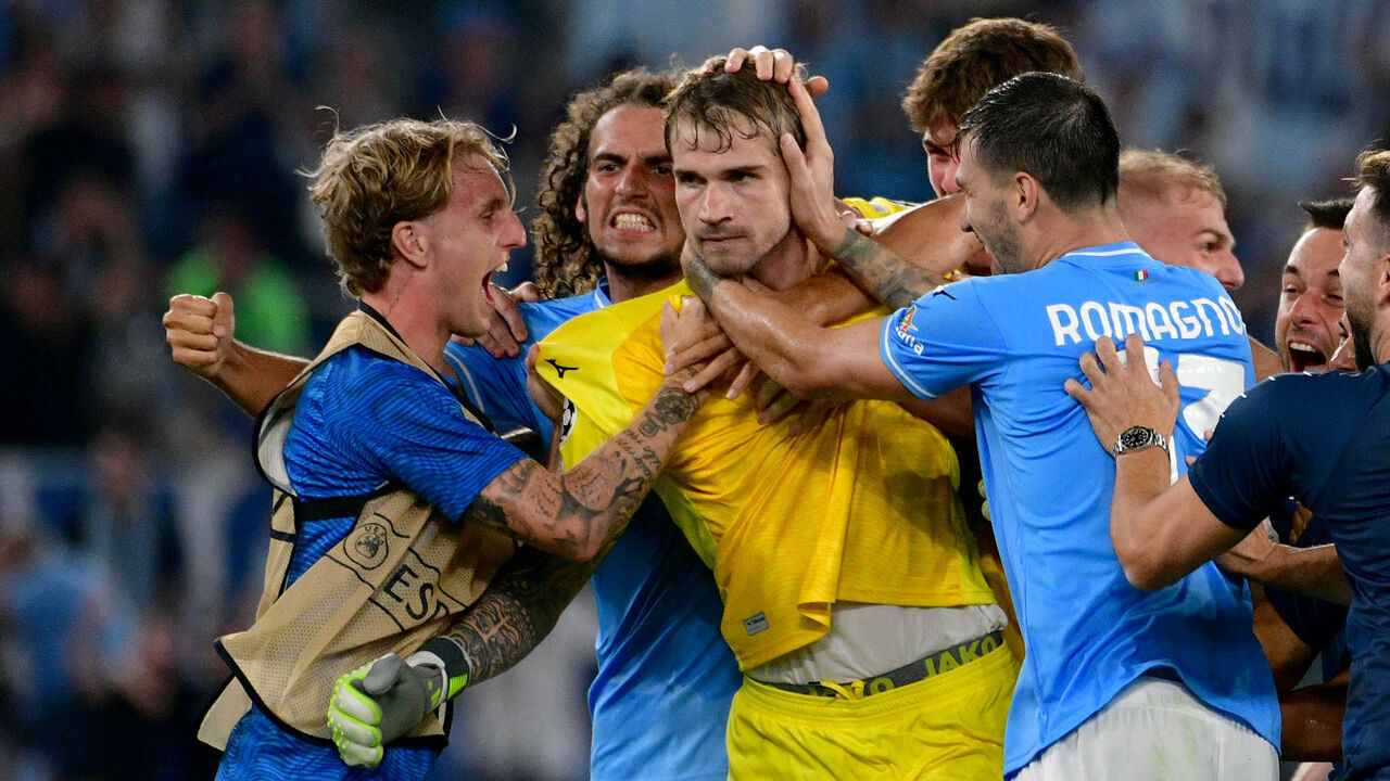 ROME, ITALY - SEPTEMBER 19: Ivan Provedel of SS Lazio goolkeeper celebrates after scoring the first goal with team mates during the UEFA Champions League match between SS Lazio and Atletico Madrid at Stadio Olimpico on September 19, 2023 in Rome, Italy.