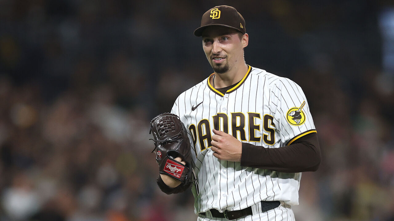 SAN DIEGO, CALIFORNIA - SEPTEMBER 19: Blake Snell #4 of the San Diego Padres reacts as he walks to the dugout after throwing seven hitless innings a game against the Colorado Rockies at PETCO Park on September 19, 2023 in San Diego, California.