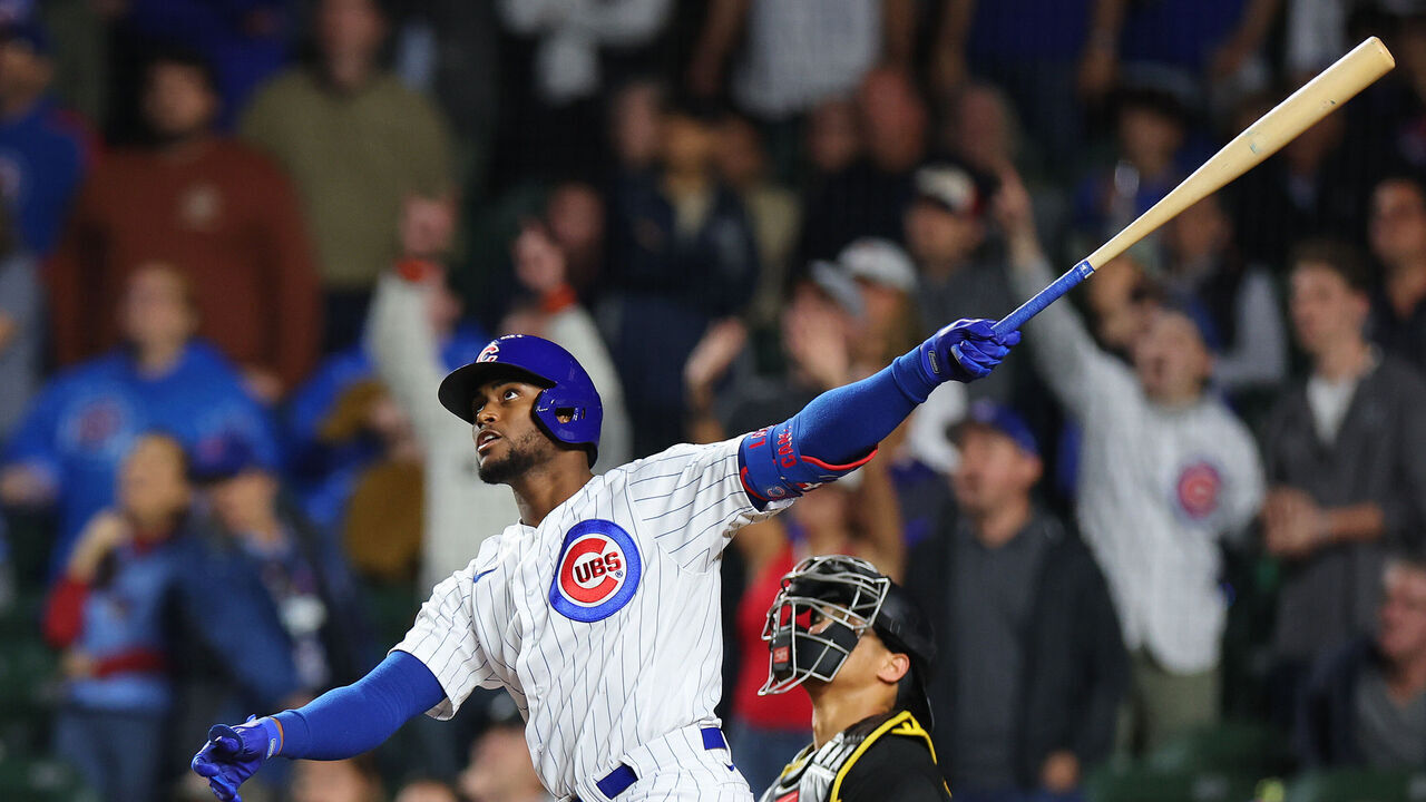 CHICAGO, ILLINOIS - SEPTEMBER 19: Alexander Canario #4 of the Chicago Cubs hits a grand slam off Kyle Nicolas #62 of the Pittsburgh Pirates (not pictured) during the eighth inning at Wrigley Field on September 19, 2023 in Chicago, Illinois.