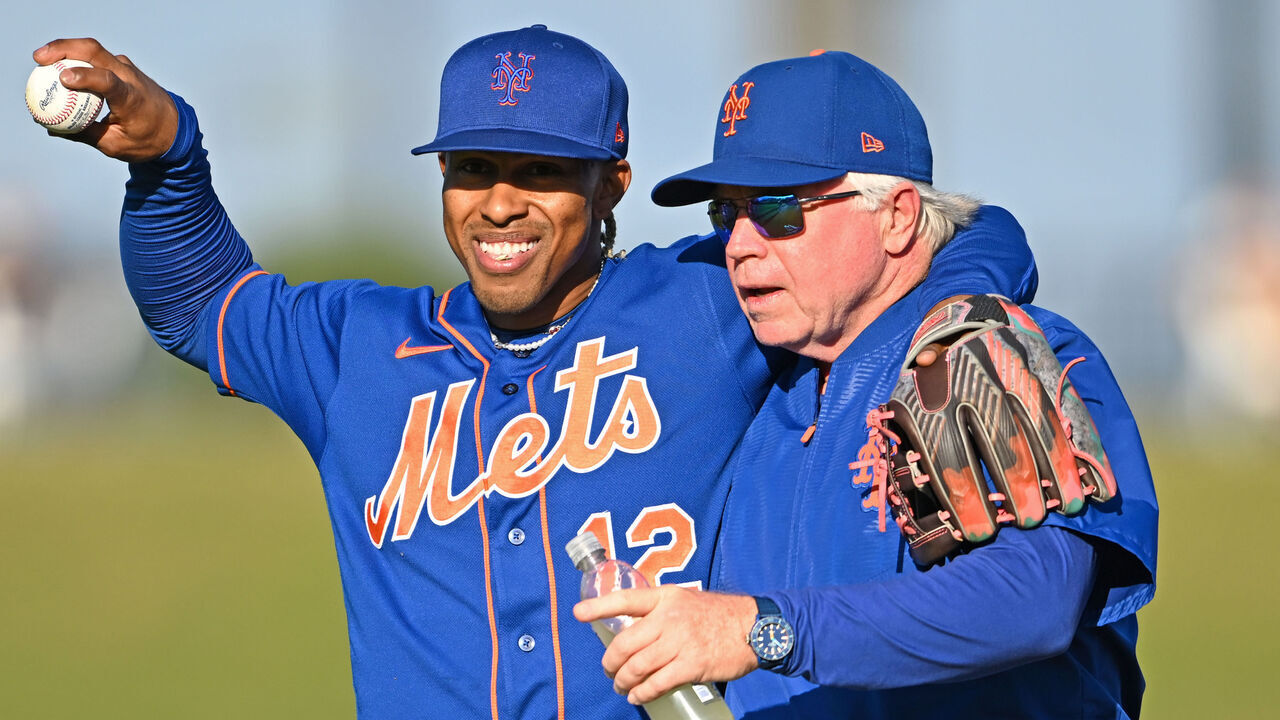 WEST PALM BEACH, FLORIDA - MARCH 20, 2023: Francisco Lindor #12 of the New York Mets talks with manager Buck Showalter #11 prior to a spring training game against the Washington Nationals at The Ballpark of the Palm Beaches on March 20, 2023 in West Palm Beach, Florida.