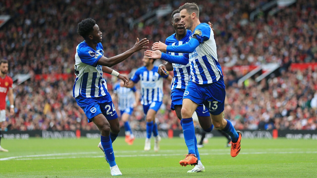 MANCHESTER, ENGLAND - SEPTEMBER 16: Pascal Gross of Brighton & Hove Albion celebrates with Simon Adingra of Brighton & Hove Albion (L) and Danny Welbeck of Brighton & Hove Albion (C) after scoring their 2nd goal during the Premier League match between Manchester United and Brighton & Hove Albion at Old Trafford on September 16, 2023 in Manchester, England.