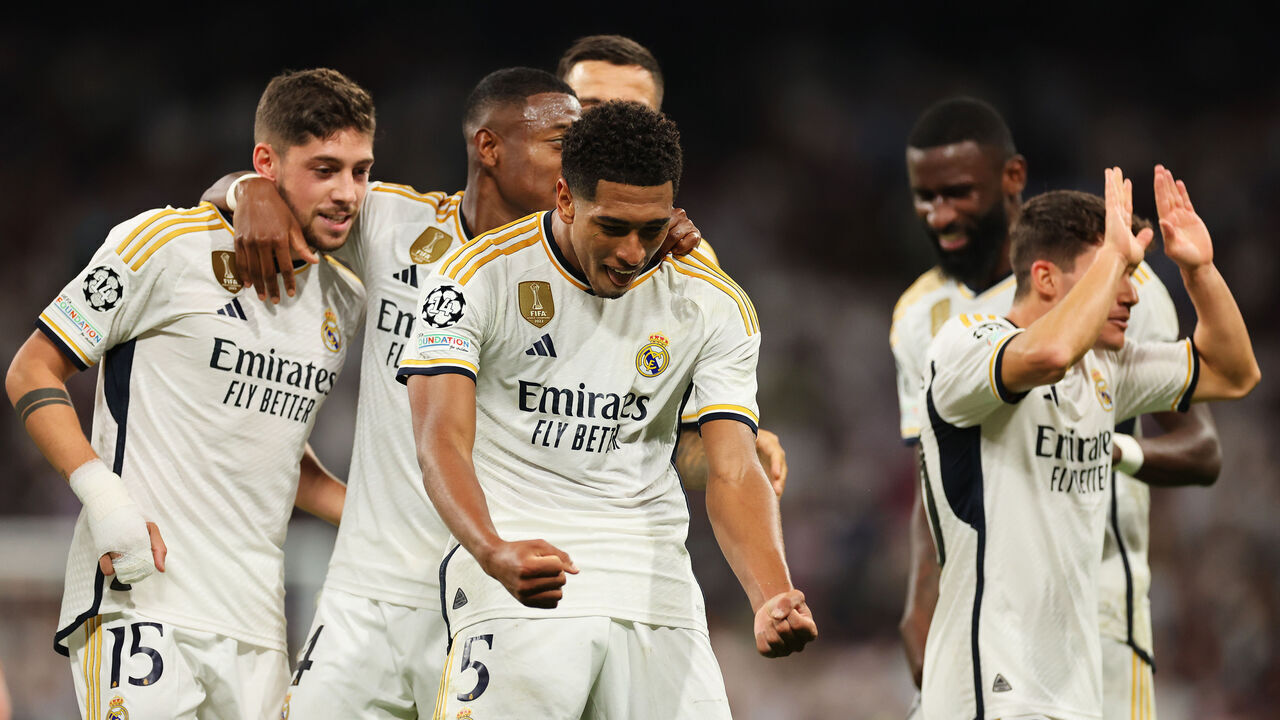 MADRID, SPAIN - SEPTEMBER 20: Jude Bellingham of Real Madrid celebrates with team mates after scoring their sides first goal during the UEFA Champions League match between Real Madrid CF and 1. FC Union Berlin at Estadio Alfredo Di Stefano on September 20, 2023 in Madrid, Spain.