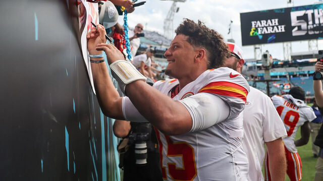 JACKSONVILLE, FLORIDA - SEPTEMBER 17: Patrick Mahomes #15 of the Kansas City Chiefs signs autographs on his way off the field after the game against the Jacksonville Jaguars at EverBank Field on September 17, 2023 in Jacksonville, Florida.