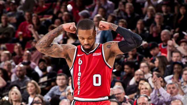 PORTLAND, OR - DECEMBER 20: Damian Lillard #0 of the Portland Trail Blazers flexes during the game against the Orlando Magic on December 20, 2019 at the Moda Center Arena in Portland, Oregon. Mandatory Copyright Notice: Copyright 2019 NBAE