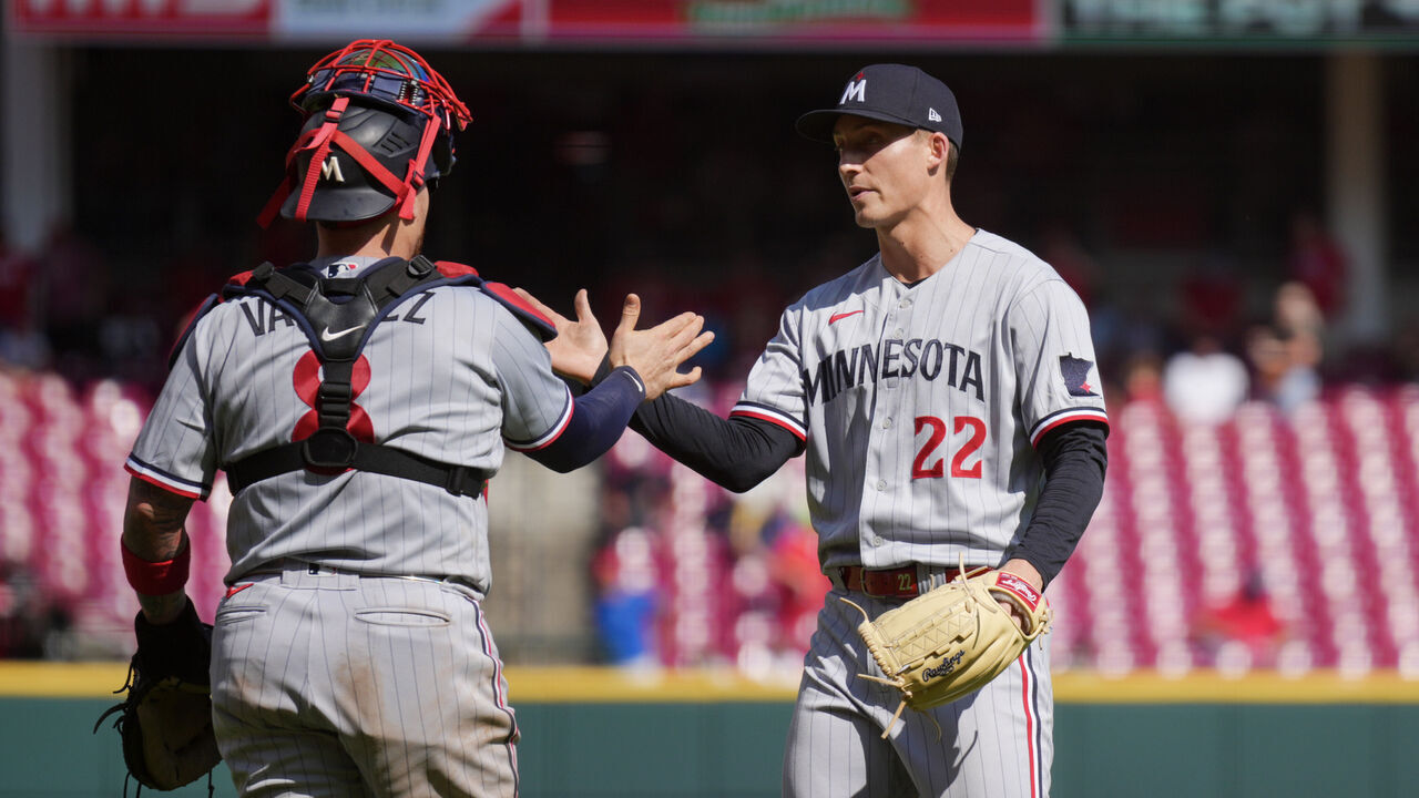 CINCINNATI, OHIO - SEPTEMBER 20: Christian Vazquez #8 of the Minnesota Twins and Griffin Jax #22 celebrate after the final out in the ninth inning against the Cincinnati Reds at Great American Ball Park on September 20, 2023 in Cincinnati, Ohio. The Twins defeated the Reds by 5-3.