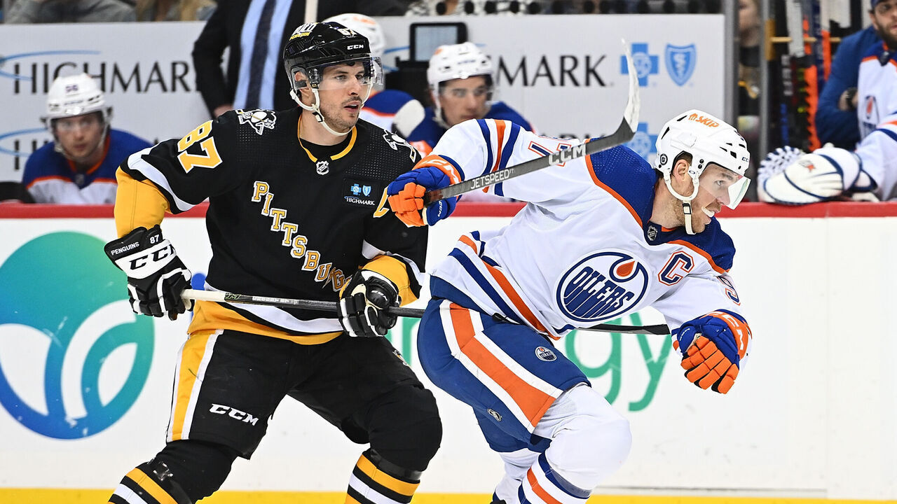 PITTSBURGH, PA - FEBRUARY 23: Connor McDavid #97 of the Edmonton Oilers skates against Sidney Crosby #87 of the Pittsburgh Penguins in the second period during the game at PPG PAINTS Arena on February 23, 2023 in Pittsburgh, Pennsylvania.