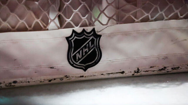 RALEIGH, NC - APRIL 04: NHL logo on a goal net prior to the first period the game Carolina Hurricanes against the Ottawa Senators at PNC Arena on April 04, 2023 in Raleigh, North Carolina. *