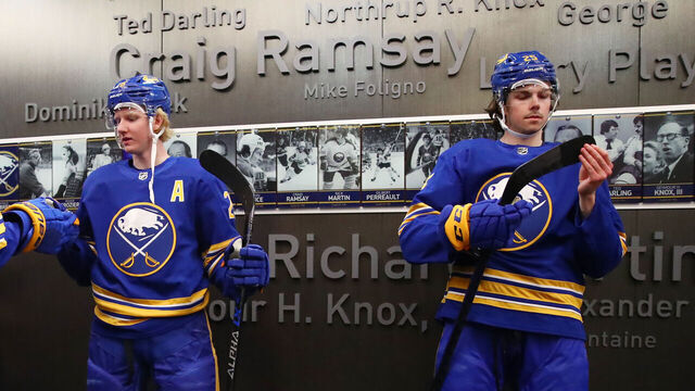 BUFFALO, NY - APRIL 14: Tage Thompson #72, Rasmus Dahlin #26 and Owen Power #25 of the Buffalo Sabres prepare before an NHL game against the St. Louis Blues on April 14, 2022 at KeyBank Center in Buffalo, New York. St. Louis won, 6-2.