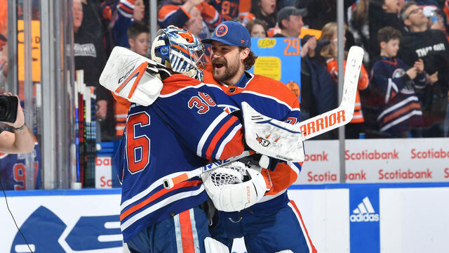 EDMONTON, CANADA - APRIL 01: Jack Campbell #36 and Stuart Skinner #74 of the Edmonton Oilers celebrate after their victory over the Anaheim Ducks on April 1, 2023 at Rogers Place in Edmonton, Alberta, Canada.