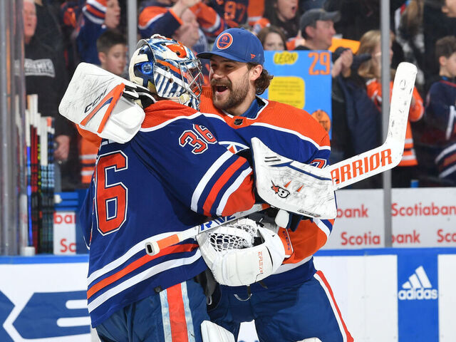 EDMONTON, CANADA - APRIL 01: Jack Campbell #36 and Stuart Skinner #74 of the Edmonton Oilers celebrate after their victory over the Anaheim Ducks on April 1, 2023 at Rogers Place in Edmonton, Alberta, Canada.