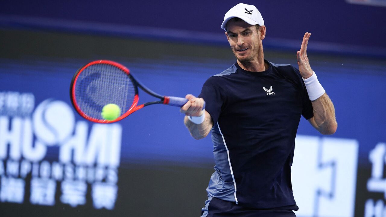 Andy Murray of Britain hits a return against Mo Yecong of China during their men's singles first round match at the Zhuhai Championships tennis tournament in Zhuhai, in China's southern Guangdong province on September 21, 2023.
