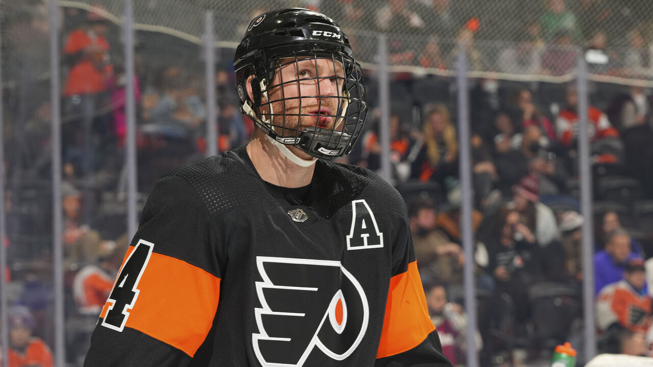 PHILADELPHIA, PA - DECEMBER 05: Sean Couturier #14 of the Philadelphia Flyers looks on against the Tampa Bay Lightning at the Wells Fargo Center on December 5, 2021 in Philadelphia, Pennsylvania. The Tampa Bay Lightning defeated the Philadelphia Flyers 7-1.