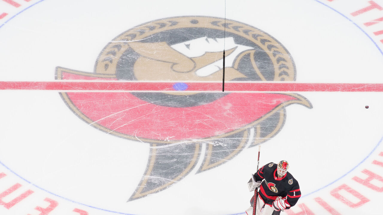 OTTAWA, ON - JANUARY 19: Marcus Hogberg #1 of the Ottawa Senators skates over the centre ice logo during warmup prior to a game against the Winnipeg Jets at Canadian Tire Centre on January 19, 2021 in Ottawa, Ontario, Canada.