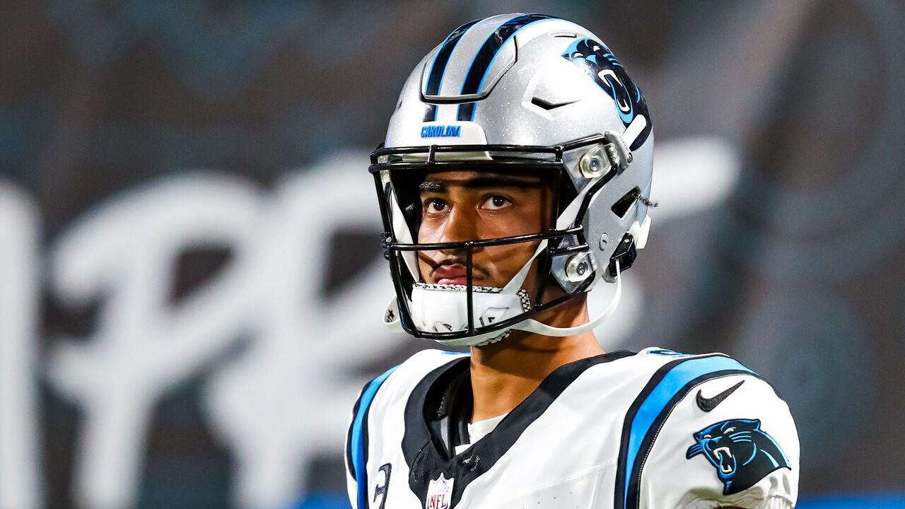 CHARLOTTE, NC - SEPTEMBER 18: Bryce Young #9 of the Carolina Panthers greets his teammates at the end of the second half during a football game against the New Orleans Saints at Bank of America Stadium in Charlotte, North Carolina on Sep 18, 2023.