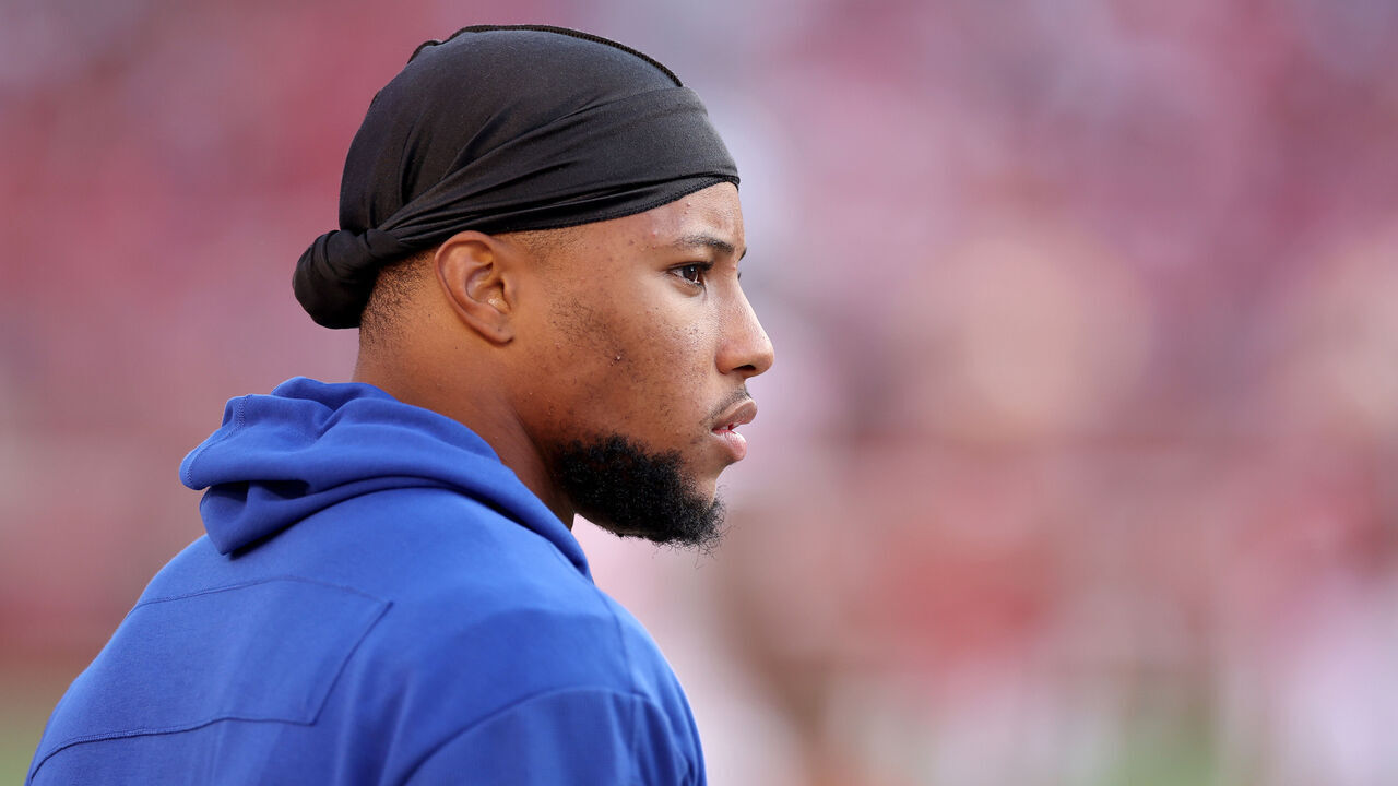 SANTA CLARA, CALIFORNIA - SEPTEMBER 21: Injured Saquon Barkley #26 of the New York Giants looks on from the sideline against the San Francisco 49ers during the first quarter in the game at Levi's Stadium on September 21, 2023 in Santa Clara, California.