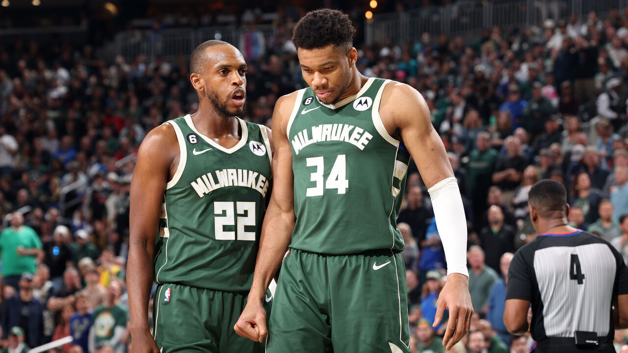 MILWAUKEE, WI - APRIL 26: Khris Middleton #22 of the Milwaukee Bucks talks to Giannis Antetokounmpo #34 during the game against the Miami Heat during Round 1 Game 5 of the 2023 NBA Playoffs on April 26, 2023 at the Fiserv Forum Center in Milwaukee, Wisconsin. Mandatory Copyright Notice: Copyright 2023 NBAE .