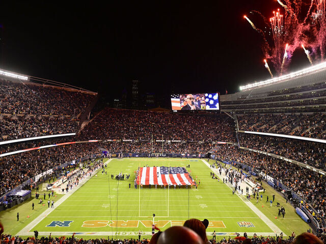 CHICAGO, ILLINOIS - OCTOBER 13: Fireworks erupt before the game between the Chicago Bears and the Washington Commanders at Soldier Field on October 13, 2022 in Chicago, Illinois.