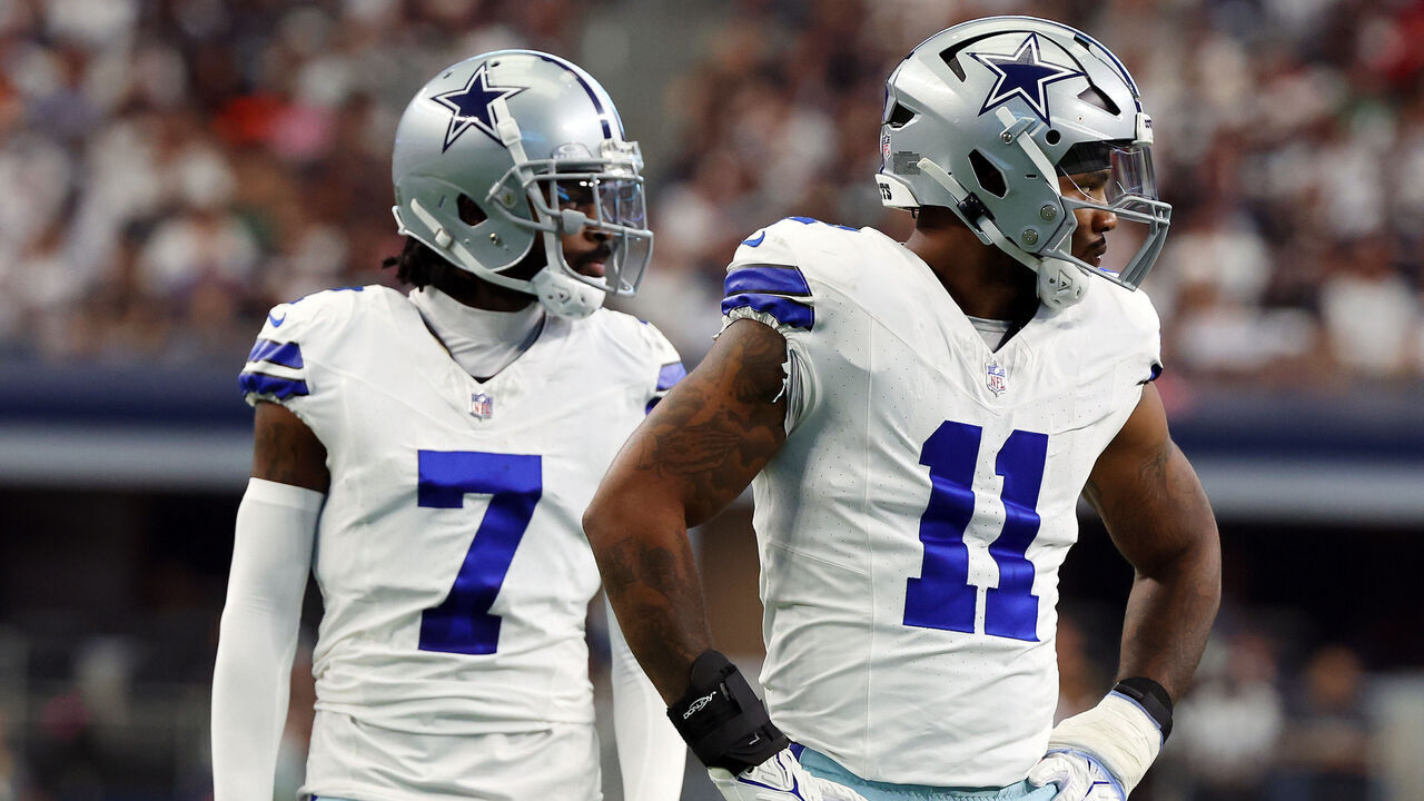 ARLINGTON, TEXAS - SEPTEMBER 17: Trevon Diggs #7 of the Dallas Cowboys and Micah Parsons #11 of the Dallas Cowboys stand on the field during a time out in a game against the New York Jets at AT&T Stadium on September 17, 2023 in Arlington, Texas.