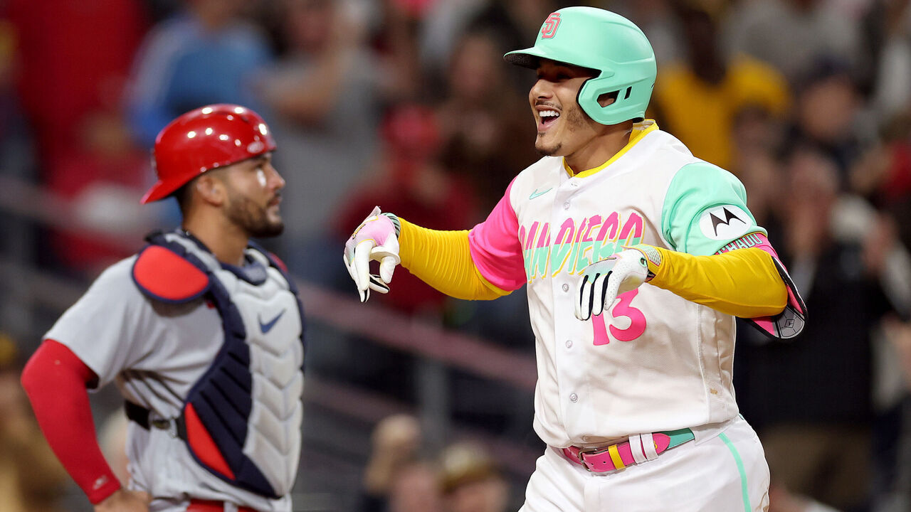 SAN DIEGO, CALIFORNIA - SEPTEMBER 22: Manny Machado #13 of the San Diego Padres reacts after connecting for a two-run homerun during the eighth inning of a game as Ivan Herrera #48 of the St. Louis Cardinals looks on at PETCO Park on September 22, 2023 in San Diego, California.