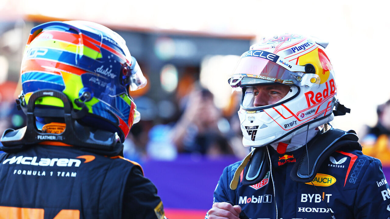 SUZUKA, JAPAN - SEPTEMBER 23: Pole position qualifier Max Verstappen of the Netherlands and Oracle Red Bull Racing and Second placed qualifier Oscar Piastri of Australia and McLaren celebrates in parc ferme during qualifying ahead of the F1 Grand Prix of Japan at Suzuka International Racing Course on September 23, 2023 in Suzuka, Japan.