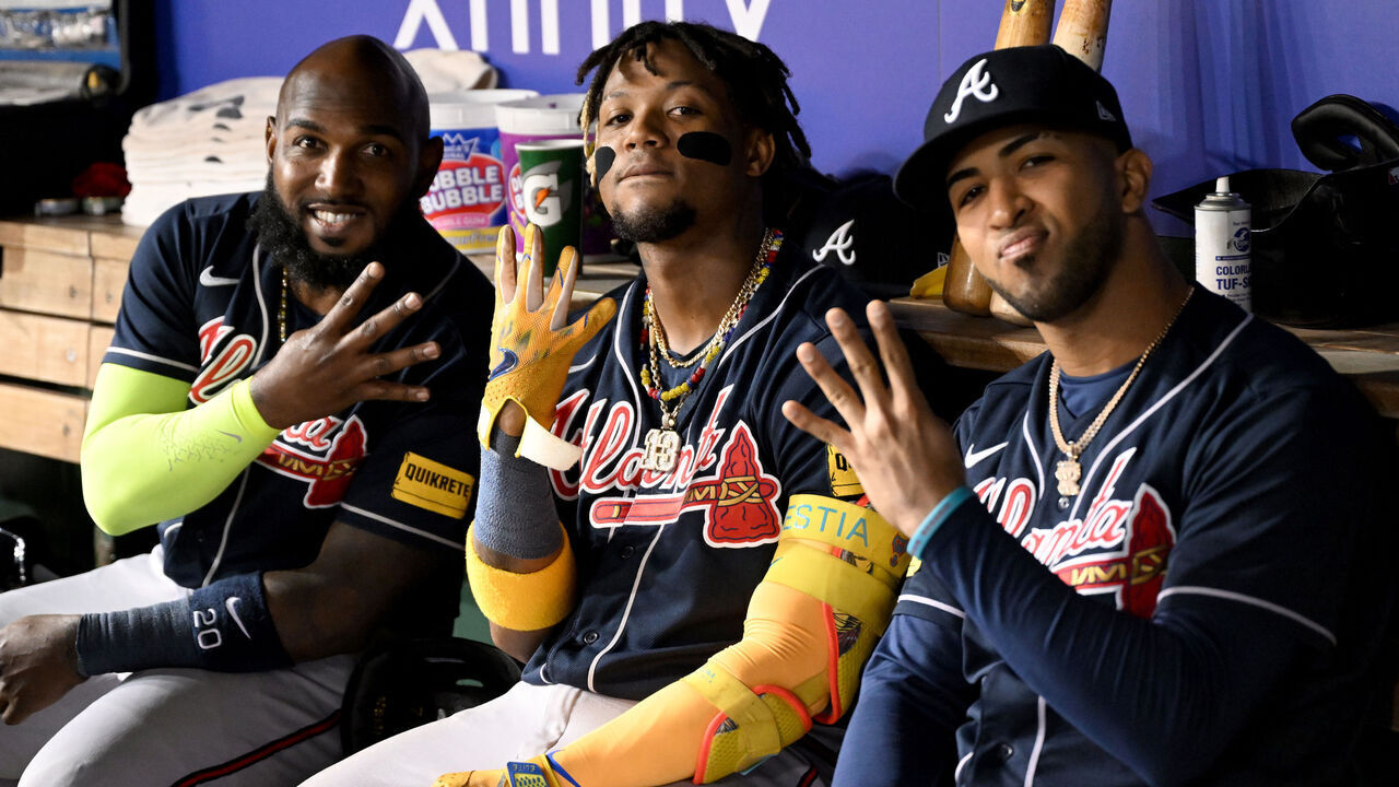 WASHINGTON, DC - SEPTEMBER 22: (L-R) Marcell Ozuna #20, Ronald Acuna Jr. #13 and Eddie Rosario #8 of the Atlanta Braves pose for a photo in the eighth inning of the game against the Washington Nationals at Nationals Park on September 22, 2023 in Washington, DC.