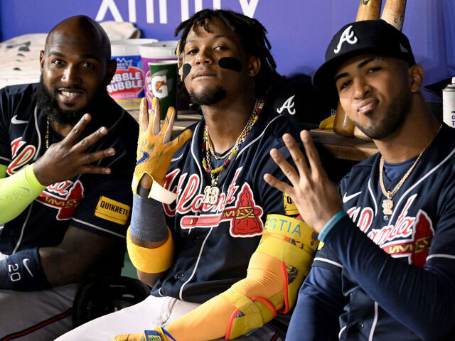 WASHINGTON, DC - SEPTEMBER 22: (L-R) Marcell Ozuna #20, Ronald Acuna Jr. #13 and Eddie Rosario #8 of the Atlanta Braves pose for a photo in the eighth inning of the game against the Washington Nationals at Nationals Park on September 22, 2023 in Washington, DC.