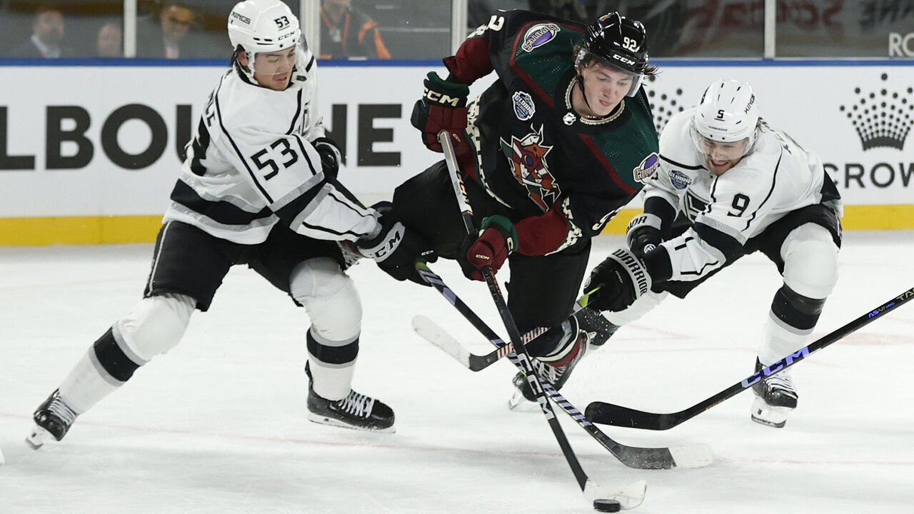 MELBOURNE, AUSTRALIA - SEPTEMBER 23: Logan Cooley of the Arizona Coyotes scores during the NHL Global Series match between Arizona Coyotes and Los Angeles Kings at Rod Laver Arena on September 23, 2023 in Melbourne, Australia.