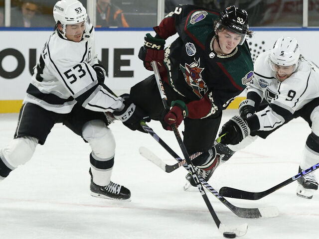 MELBOURNE, AUSTRALIA - SEPTEMBER 23: Logan Cooley of the Arizona Coyotes scores during the NHL Global Series match between Arizona Coyotes and Los Angeles Kings at Rod Laver Arena on September 23, 2023 in Melbourne, Australia.