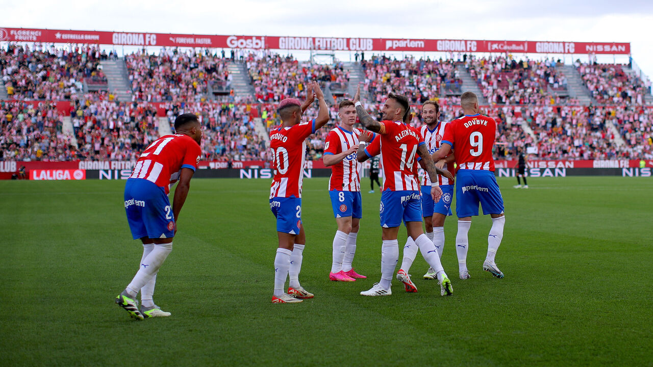 GIRONA, SPAIN - SEPTEMBER 23: Girona players celebrate after Savio of Girona (not pictured) scores the team's fifth goal during the LaLiga EA Sports match between Girona FC and RCD Mallorca at Montilivi Stadium on September 23, 2023 in Girona, Spain.