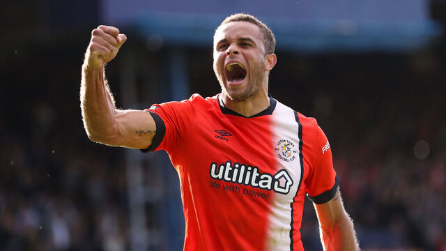 LUTON, ENGLAND - SEPTEMBER 23: Carlton Morris of Luton Town celebrates their first goal during the Premier League match between Luton Town and Wolverhampton Wanderers at Kenilworth Road on September 23, 2023 in Luton, England.