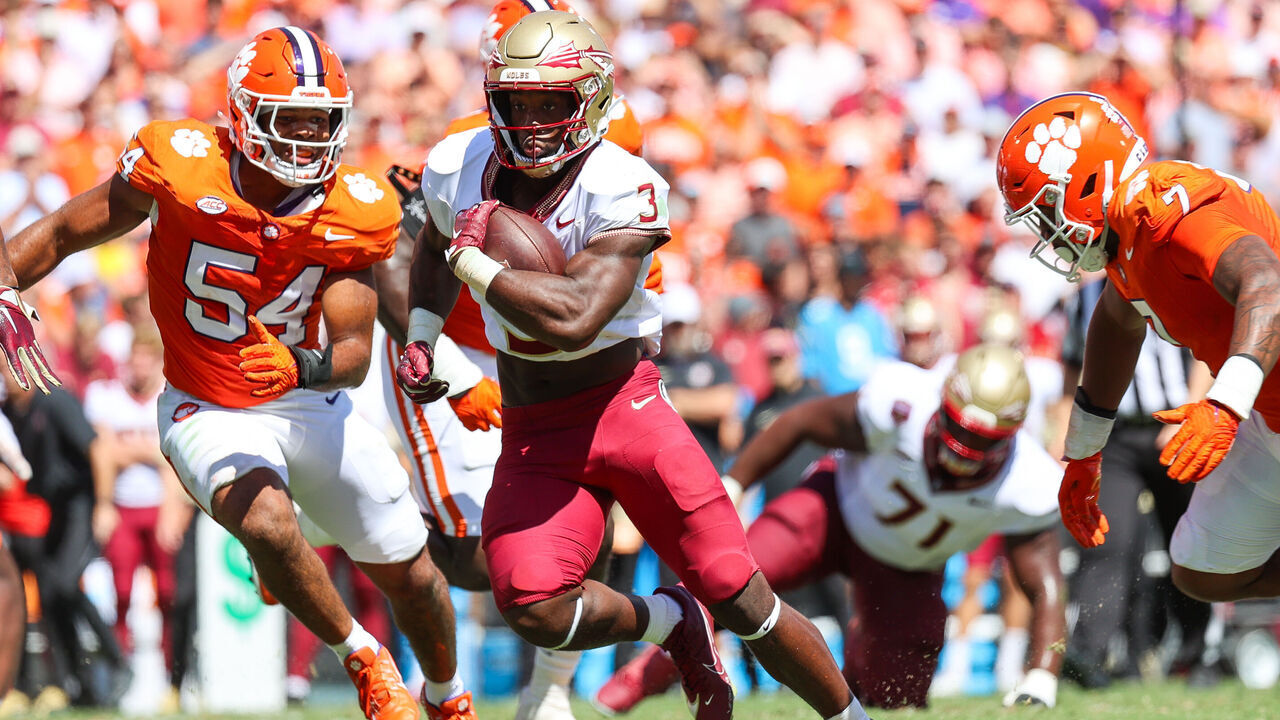 CLEMSON, SOUTH CAROLINA - SEPTEMBER 23: Trey Benson #3 of the Florida State Seminoles runs the ball against the Clemson Tigers during the second quarter at Memorial Stadium on September 23, 2023 in Clemson, South Carolina.